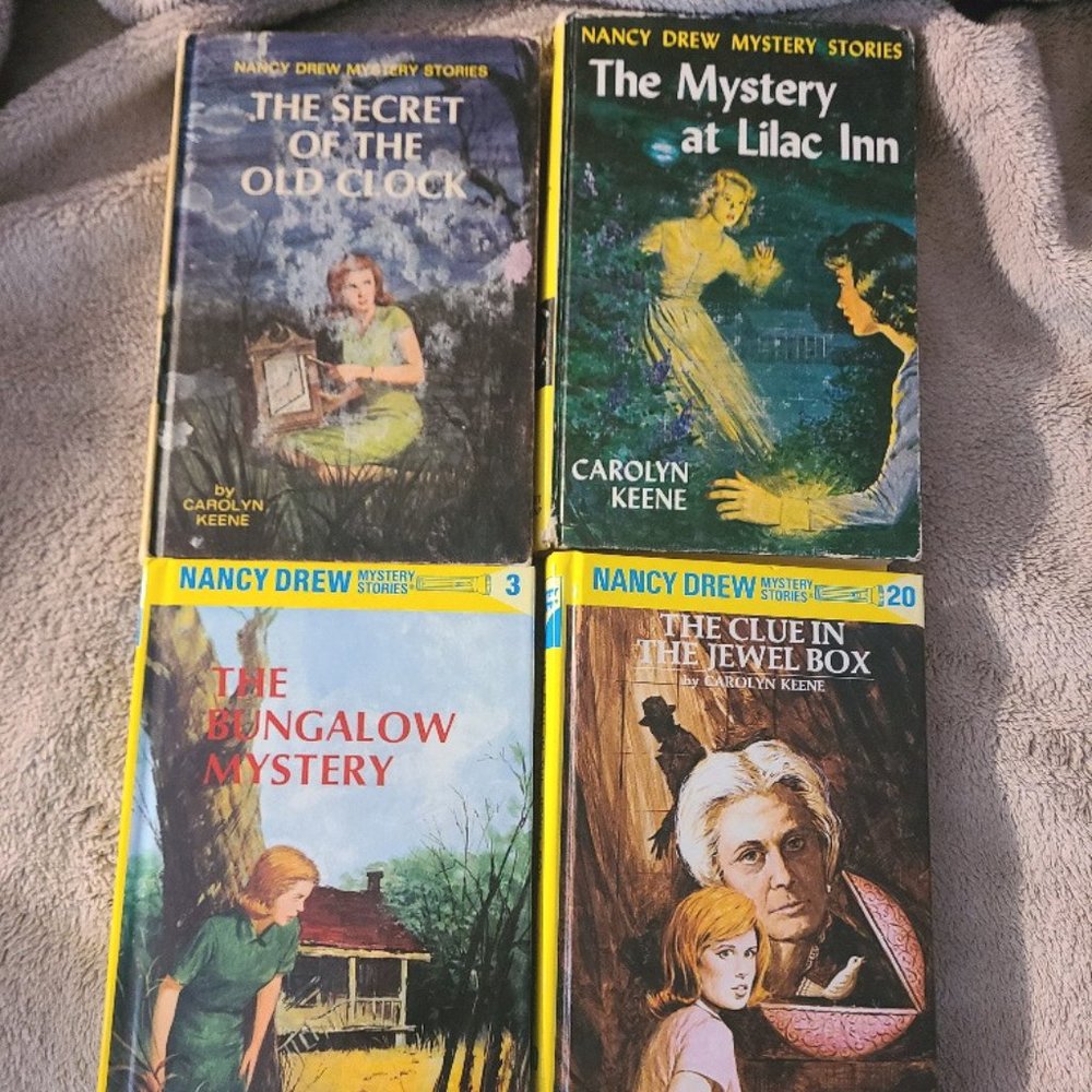 4 Nancy Drew books- 2 newer, 2 older ones